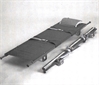 Stretcher, foldable in width